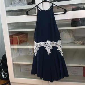 White and navy blue romper